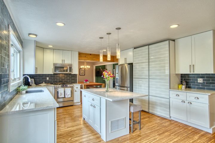 The primary, indoor kitchen at the home for sale located at 115 Baylor Dr, Longmont, Colorado.